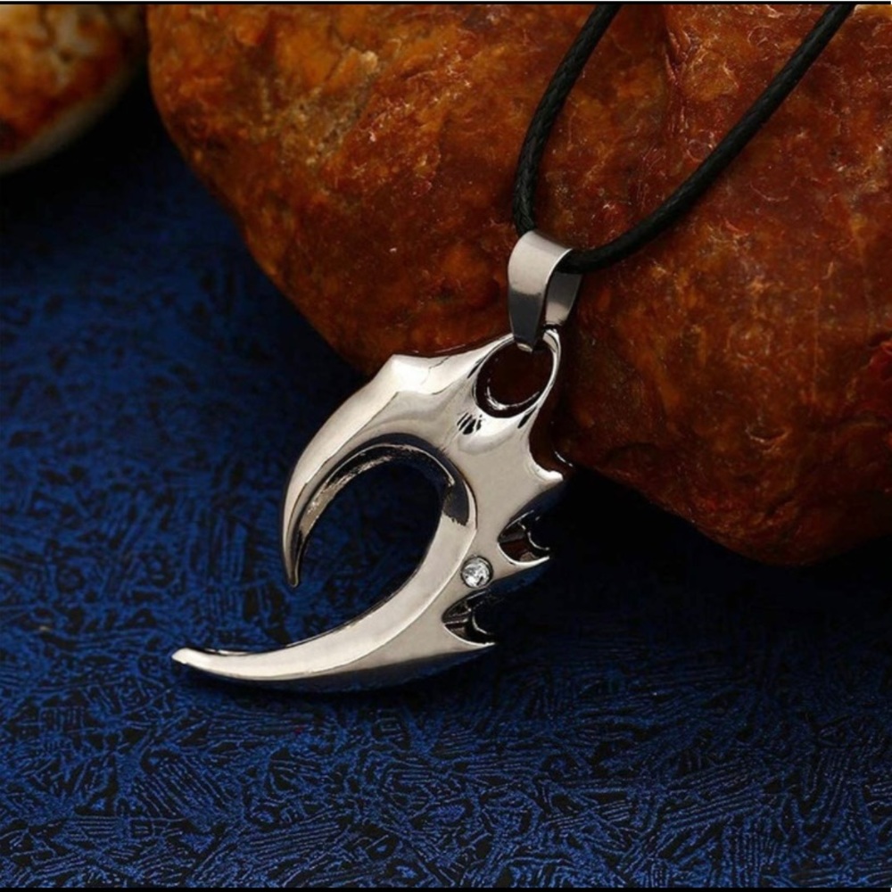 Silver Tone Tribal symbol necklace